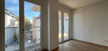 Erstbezug: 4-Zimmer Wohnung mit Balkon, Dusche &amp; Badewanne - Ausblick Nordbergstraße - Nahe U4 - hauseigenes Gym, Waschküche, Co-Working Space &amp; Dachterrasse