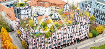 Grüne Oase im Herzen der Stadt: DG-Wohnung im Hundertwasserhaus