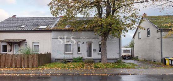 Sanierungsbedürftige Doppelhaushälfte mit Garten, flexiblem Raumkonzept und Potenzial für Familien