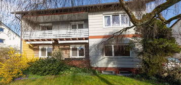 Kinderfreundliche Erdgeschosswohnung mit Garten, Garage und Carport