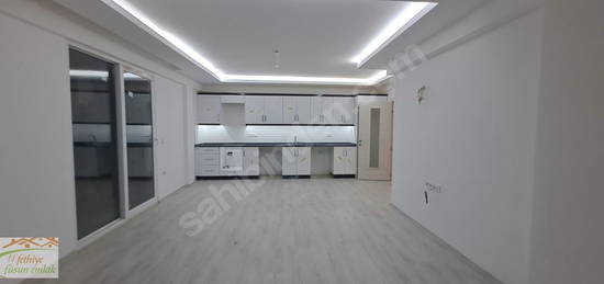 FÜSUN EMLAK'TAN GİRİŞ KATI GENİŞ 2+1 YENİ DAİRE SATILIKTIR