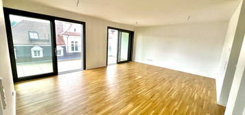 Erstbezug - Moderne 3 Zimmer NB Wohnung mit EBK, TG und großem Balkon