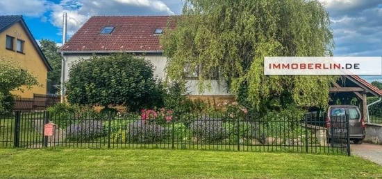 IMMOBERLIN.DE - Sehr wohnliches Einfamilienhaus auf großartigem Grundstück in ländlicher Lage