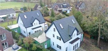 Moderne Wohnträume in Halstenbek: Erstklassiges Einfamilienhaus mit Terrasse und Garten