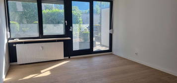 Gemütliche 1-Zimmer-Wohnung mit Terrasse und Tiefgaragenstellplatz