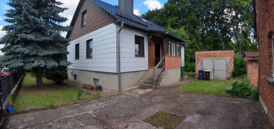 Familienhaus "Stralsund 83 G" mit ausgebauten Dachgeschoss und Naturpool in Gossel