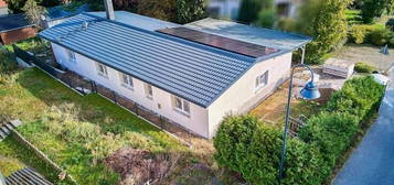 Zögern Sie nicht: Dank Erstbezug und gehobener Ausstattung energieeffizienter Bungalow mit Garten