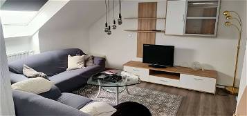Stilvolle 3,5-Zimmer-DG-Wohnung mit Einbauküche in Sindelfingen Spitzholz