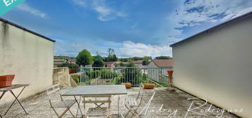 Maison mitoyenne avec terrain au cœur du village