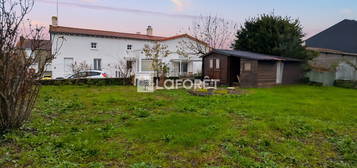 Maison Andrezé 105 m2 avec garage et jardin.