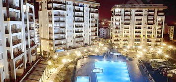 EMERALD PARADİSE'ta SATILIK 1+1 EŞYALI DAİRE