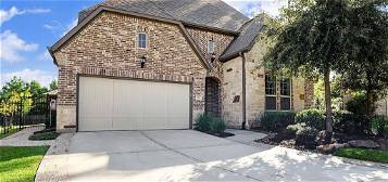2 E Twin Ponds Ct, Tomball, TX 77375