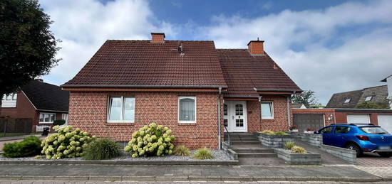 Charmantes Einfamilienhaus 
mit Wintergarten, Teilkeller u. Garage 
in Rheine-Eschendorf