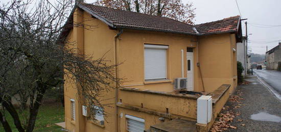 Maison en bon état avec jardin