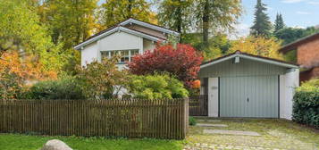 Deisenhofen: Wunderschönes Einfamilienhaus mit Hanglage und großem Garten