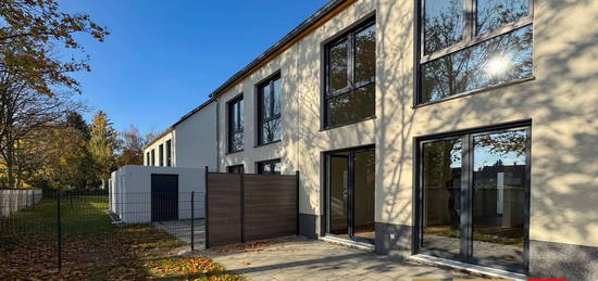 Neubau-Einfamilienhaus mit eigenem Garten | Garage + Stellplatz l Wärmepumpe + PV-Anlage