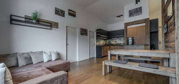 "Smart Living" - Dachgeschosswohnung in Brixen