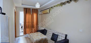 BUCA KURUÇEŞME MAHALLESİ'NDE SATILIK 1+1 DAİRE