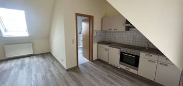 Gepflegtes 1-Zimmer- Appartement mit EBK, Garage in Bruck in der Oberpfalz