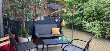 2 Zimmer Wohnung mit Terrasse und Parkplatz in grüner Wohnanlage