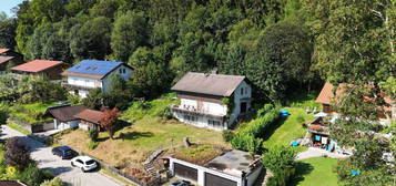 Grundstück mit Einfamilienhaus und unverbaubarem Weitblick