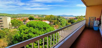 Appartement T3 avec balcon, stationnement et cave