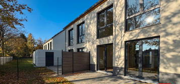 Neubau-Einfamilienhaus mit eigenem Garten | Garage + Stellplatz l Wärmepumpe + PV-Anlage