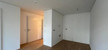 Erstbezug: 2-Zimmer Wohnung mit Balkon - hofseitig - Nahe U4 - hauseigenes Gym, Waschküche, Co-Working Space &amp; Dachterrasse