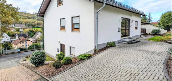 Vielseitiges Einfamilienhaus mit Einliegerwohnung, Dachterrasse und Ausbaupotenzial!