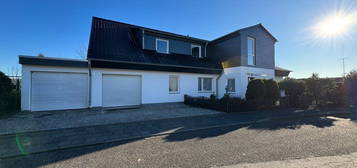 Rohbau - Wohnung im Obergeschoss mit Sonnenbalkon und Garage in ruhiger Lage