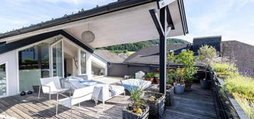 MATTSEE | Luxuriöse Loft-Wohnung in Seenähe mit 360° Dachterrasse in zentraler Lage