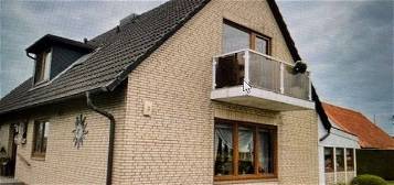 Zu vermieten - gepflegte Dachgeschosswohnung im Zweifamilienhaus in Kröppelhagen  