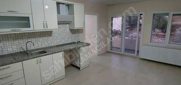 KAMACILAR EMLAK ÇEŞME OVACIK 2+1 DAİRE KALORİFERLİ MERKEZDE YENİ