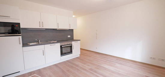 KFW40/Neuwertiges 1-Zimmer-Apartment im OG mit EBK u. hochwertiger Ausstattung in Zentrumslage (Ref. 000RAP1011)