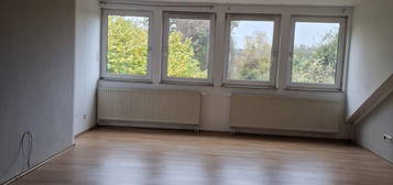 Dachgeschoßwohnung mit Balkon