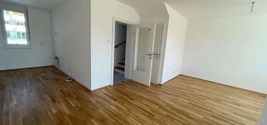 Maisonette-Wohnung mit Eigengarten! Wohnen Sie jetzt im Reihenhaus-Stil