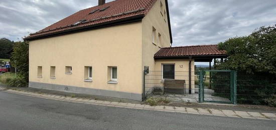 Gemütliches Eigenheim mit Garage und großem Grundstück