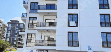 KÖRFEZDE DENİZ MANZARALI LÜKS 1+1 SATILIK DAİRE