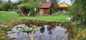 Älteres Einfamilienhaus mit Traumgarten und Biotop