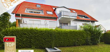 Ein liebevolles Zuhause: Traumhafte Maisonette-Wohnung in schöner Lage mit 2 TG-Stellplätzen.