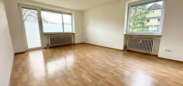 Attraktive 2-Zimmer-Wohnung mit eigenem Garten, Terrasse & großem Südwestbalkon, ca. 77,8 qm im Erdgeschoss