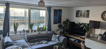 Studio in een woonboot op de Woonschepenhaven