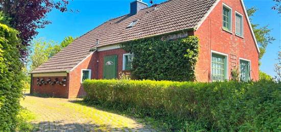 Landleben trifft Nordseeluft: Landhaus auf rückwärtig unverbautem Grundstück in Buttforde-Wittmund!