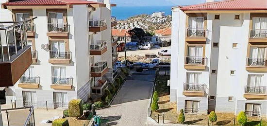 Kuşadası Değirmenderede havuzlu Deniz manzaralı satılık daire