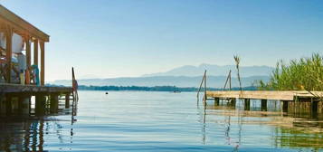 Absolute Top Lage - Wohnen am Wörthersee mit atemberaubendem eigenen Seezugang