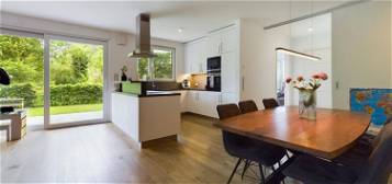 Modernes und gehobenes Wohnen mit A+ Standard in neuwertiger Gartenwohnung mit Tiefgaragenstellplatz