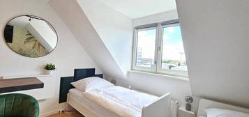 Moderne 1-Zimmerwohnung mit TV, Wlan, Einzelbetten, Küche, Dusche/Wc und Waschmaschine