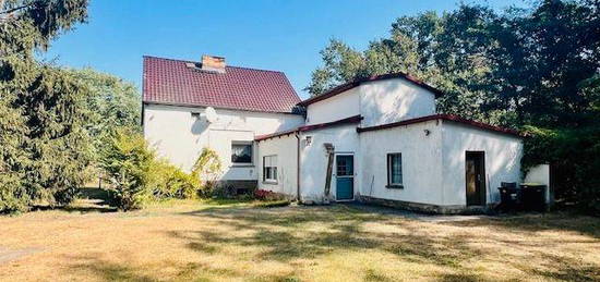 Wohnhaus mit Werkstatt und NG auf großem Grundstück mit Wald