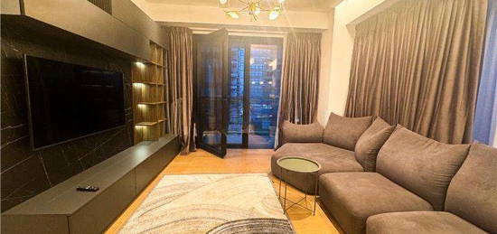 Apartament cu camere.One Eliade Towers