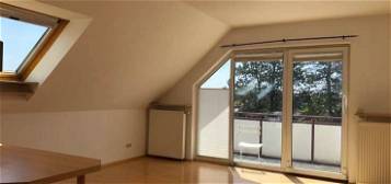 Möblierte, stilvolle und gepflegte 2-Zimmer-DG-Wohnung mit Balkon und Einbauküche in Rumpemheim